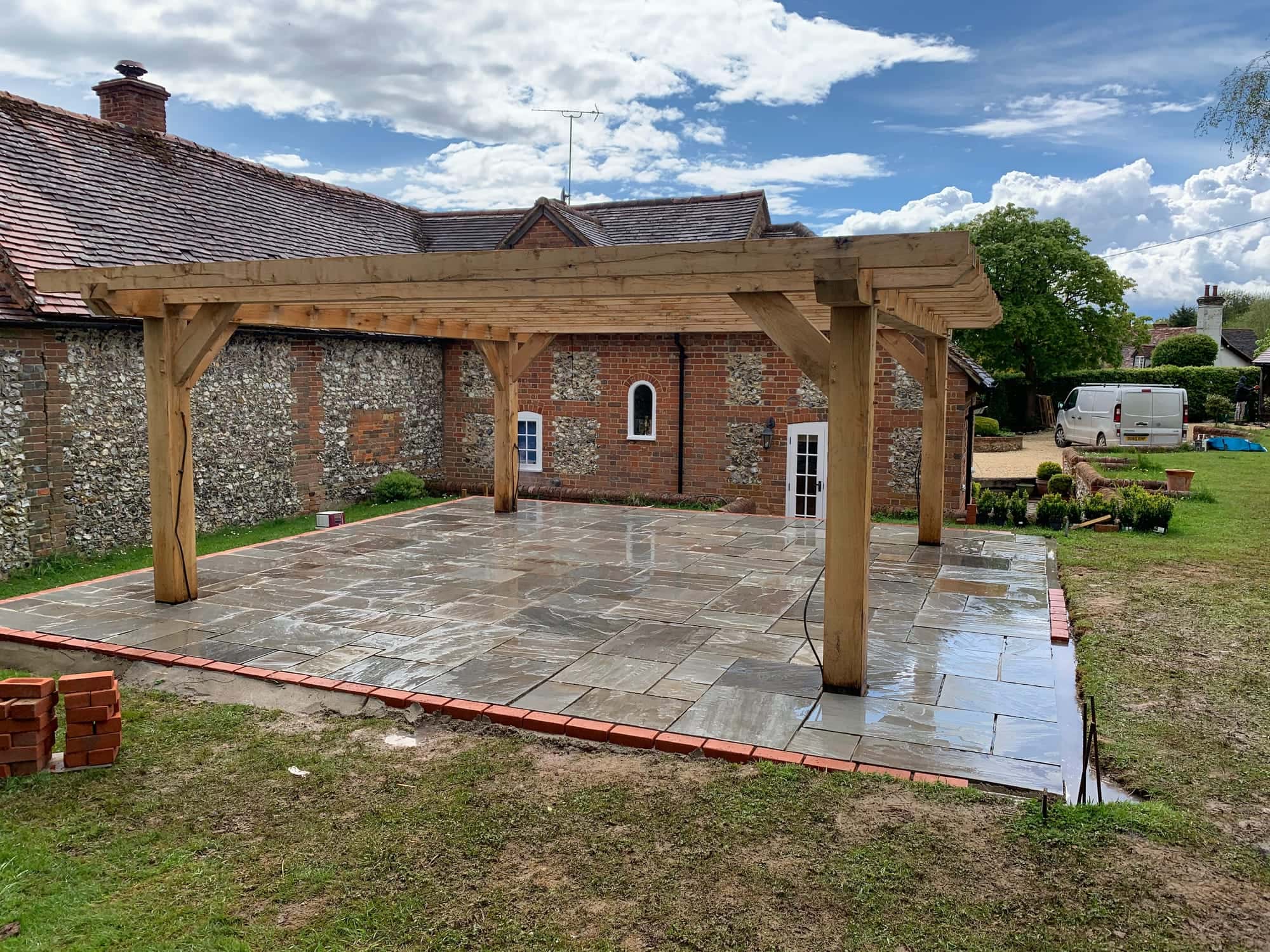 Timber pergola on a newly laid stone patio